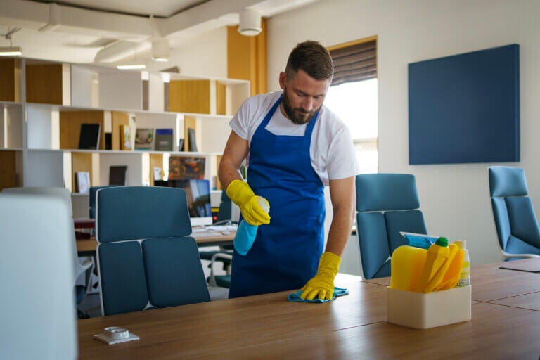 professional cleaning service person cleaning office